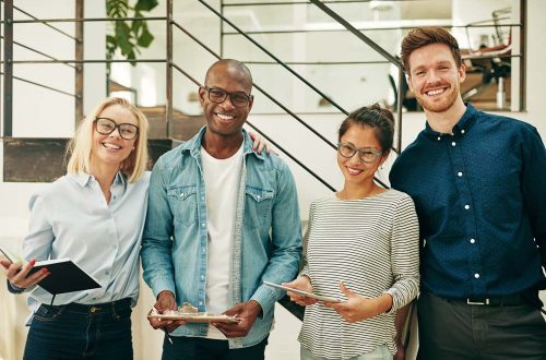 diverse-businesspeople-laughing-while-working-toge-2026-01-05-00-58-34-utc